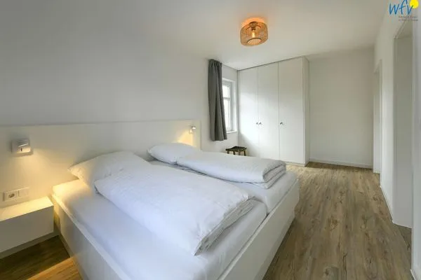 Schlafzimmer Haus am Dorfbrunnen Ferienwohnung Muschel