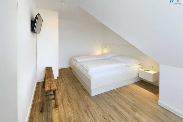 Schlafzimmer Haus am Dorfbrunnen Ferienwohnung Sand