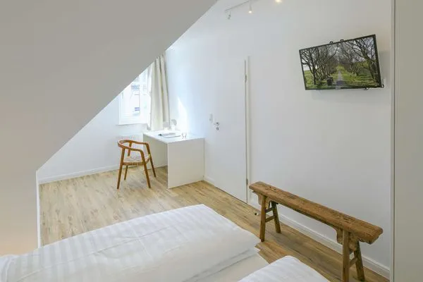 Schlafzimmer Haus am Dorfbrunnen Ferienwohnung Sand