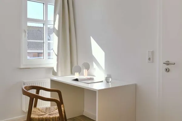 Schlafzimmer Haus am Dorfbrunnen Ferienwohnung Sand