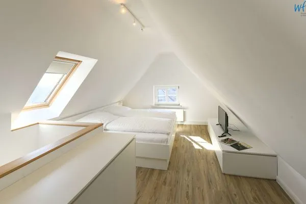 Schlafzimmer Haus am Dorfbrunnen Ferienwohnung Sand