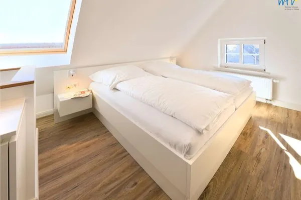 Schlafzimmer Haus am Dorfbrunnen Ferienwohnung Sand