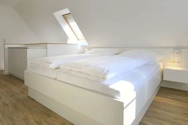 Schlafzimmer Haus am Dorfbrunnen Ferienwohnung Sand