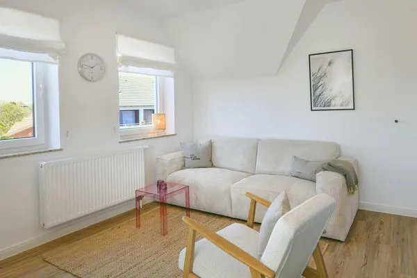 Wohnzimmer Haus am Dorfbrunnen Ferienwohnung Düne