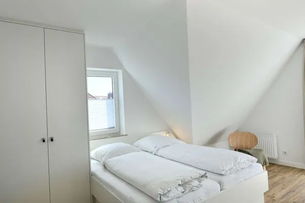 Schlafzimmer Haus am Dorfbrunnen Ferienwohnung Düne