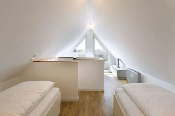 Schlafzimmer Haus am Dorfbrunnen Ferienwohnung Düne