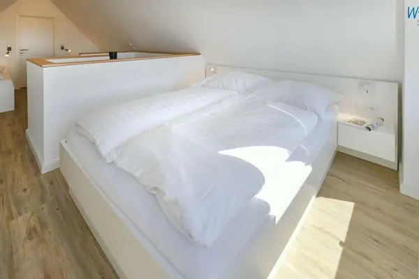 Schlafzimmer Haus am Dorfbrunnen Ferienwohnung Düne