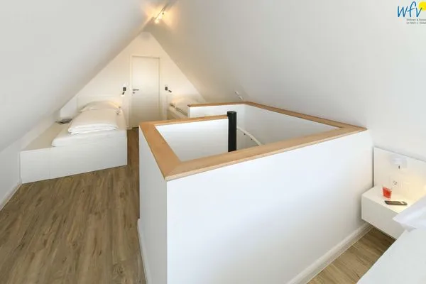 Schlafzimmer Haus am Dorfbrunnen Ferienwohnung Düne