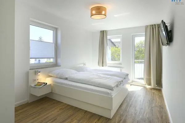 Schlafzimmer Haus am Dorfbrunnen Ferienwohnung Möwe