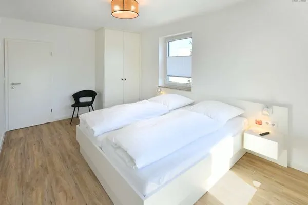 Schlafzimmer Haus am Dorfbrunnen Ferienwohnung Möwe