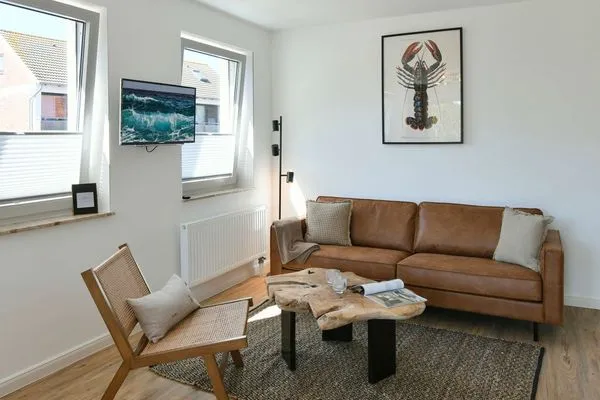 Wohnzimmer Haus am Dorfbrunnen Ferienwohnung Möwe
