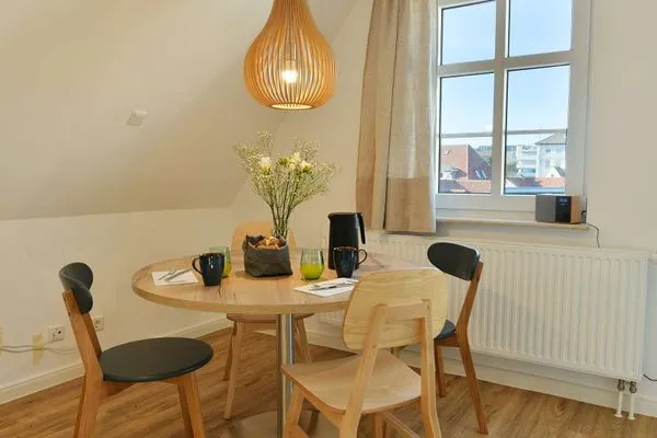 Wohnzimmer Haus am Dorfbrunnen Ferienwohnung Meer