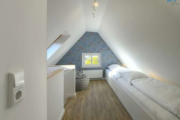 Schlafzimmer Haus am Dorfbrunnen Ferienwohnung Meer