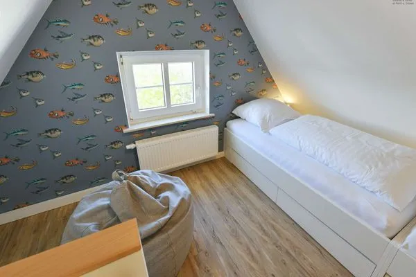 Schlafzimmer Haus am Dorfbrunnen Ferienwohnung Meer