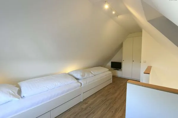 Schlafzimmer Haus am Dorfbrunnen Ferienwohnung Meer