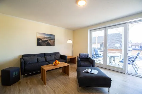 Wohnzimmer Haus *Weiße Düne* Ferienwohnung *Weiße Düne 5*