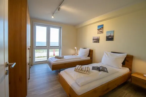 Schlafzimmer Haus *Weiße Düne* Ferienwohnung *Weiße Düne 6*