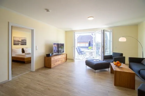 Wohnzimmer Haus *Weiße Düne* Ferienwohnung *Weiße Düne 6*