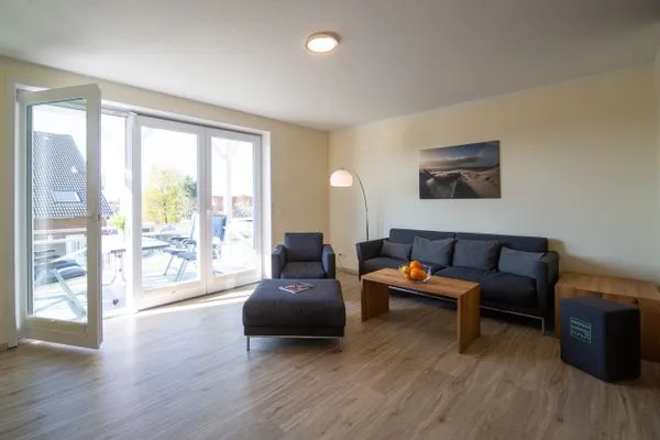Wohnzimmer Haus *Weiße Düne* Ferienwohnung *Weiße Düne 6*