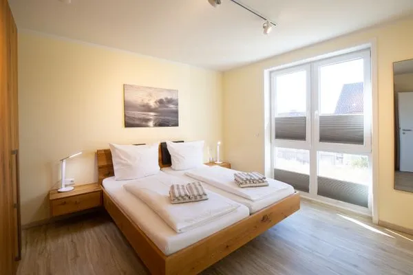 Schlafzimmer Haus *Weiße Düne* Ferienwohnung *Weiße Düne 6*