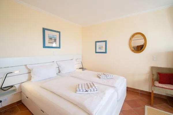 Schlafzimmer Haus Kap Hoorn Ferienwohnung Seeblick