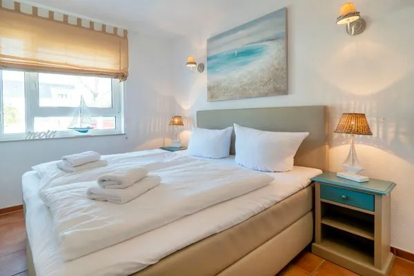 Schlafzimmer mit Doppelbett Residenz am Strand Wohnung 2-28