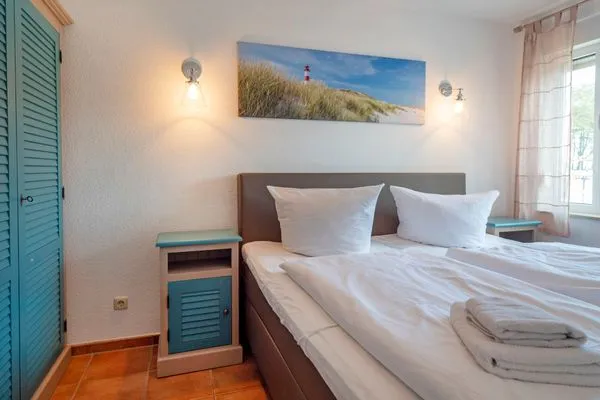Schlafzimmer mit Doppelbett Residenz am Strand Wohnung 2-29