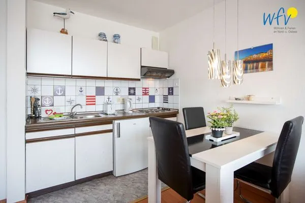 Küche / Küchenzeile Holiday Residenz I Ferienwohnung Küstenkind