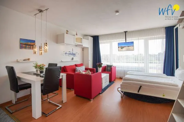 Wohnzimmer Holiday Residenz I Ferienwohnung Küstenkind