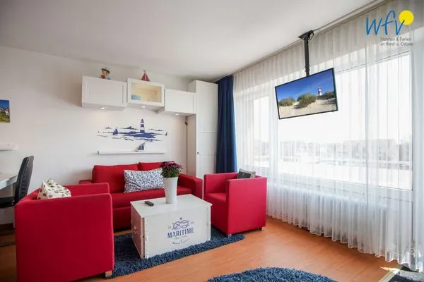 Wohnzimmer Holiday Residenz I Ferienwohnung Küstenkind