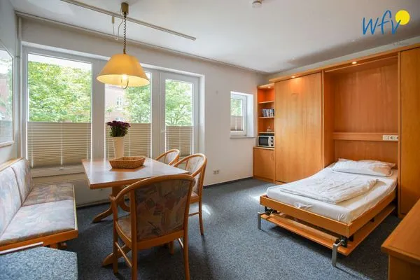 Schlafmöglichkeiten im Wohnzimmer Appartement-Haus Regina Ferienwohnung 6