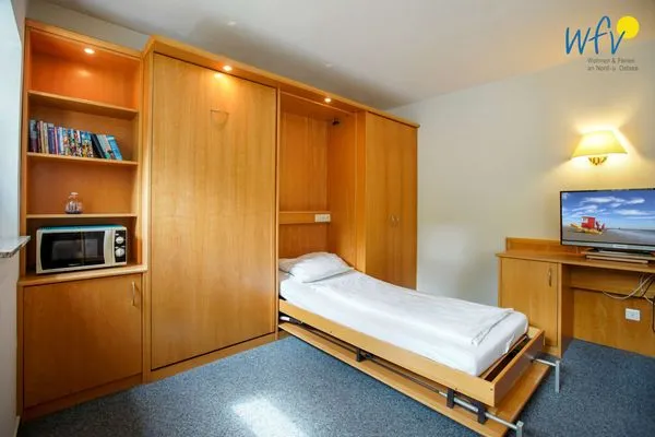 Schlafmöglichkeiten im Wohnzimmer Appartement-Haus Regina Ferienwohnung 6