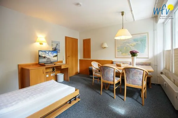 Schlafmöglichkeiten im Wohnzimmer Appartement-Haus Regina Ferienwohnung 6