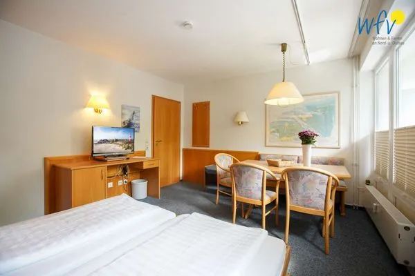 Schlafmöglichkeiten im Wohnzimmer Appartement-Haus Regina Ferienwohnung 6