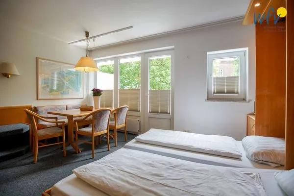 Schlafmöglichkeiten im Wohnzimmer Appartement-Haus Regina Ferienwohnung 6