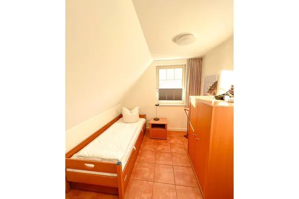 Schlafzimmer mit Einzelbett Mühlenstrasse 19 - Wohnung 4