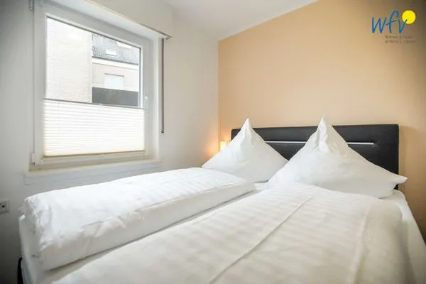 Schlafzimmer Haus Kiebitzdelle-Westdünen 1 Ferienwohnung Südstrand Düne 1