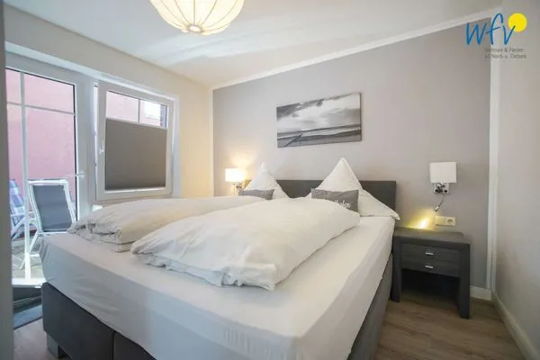 Schlafzimmer Hus Strandloperke Ferienwohnung 5