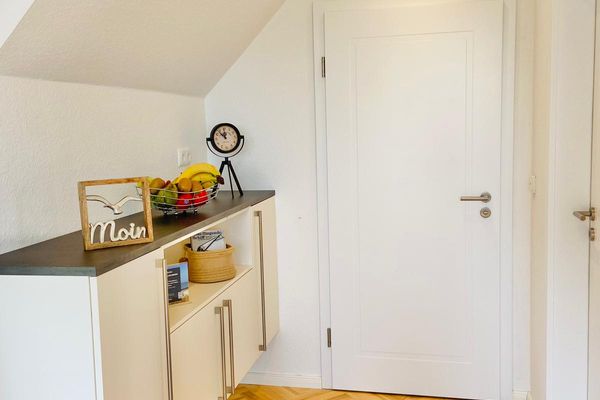 Dünenhaus Ferienwohnung - De Düün Fiev Wangerooge - Der Weg zum Bad und Schlafzimmer.