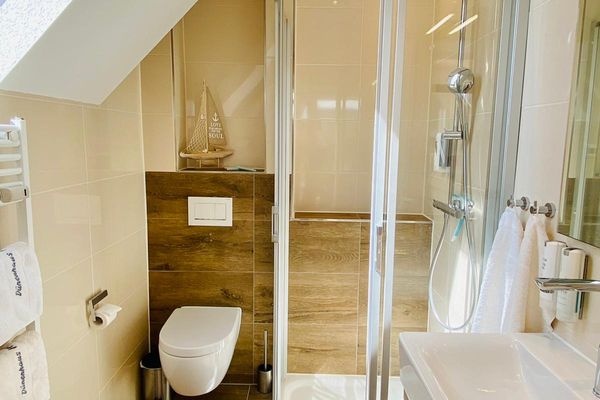 Dünenhaus Ferienwohnung - De Düün Fiev Wangerooge - Rainshower & Tageslichtbad.