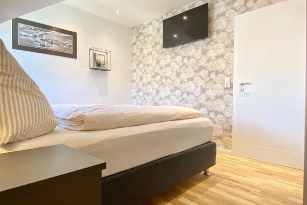 Dünenhaus Ferienwohnung - De Düün Sess Wangerooge - Rosenkrieg? Hier mit Sicheheit nicht.