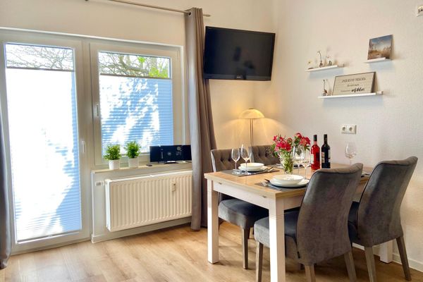 Dünenhaus Ferienwohnung - De Düün Veer Wangerooge - Weiß oder Rotwein dazu?