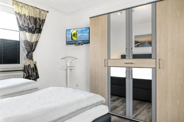 Schlafzimmer Ferienanlage Pfeiffer Haus Strandrose