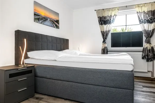 Schlafzimmer Ferienanlage Pfeiffer Haus Strandrose