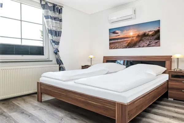 Schlafzimmer Ferienanlage Pfeiffer Haus Strandrose