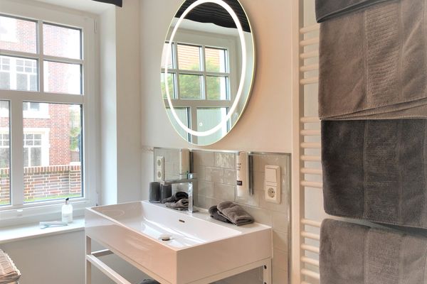 Lindenhof Ferienwohnung Strandmuschel Wangerooge - Spieglein, spieglein and der Wand...