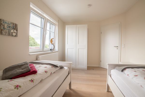 Ostfreesenhuus Ostwind Aurich - Schlafzimmer