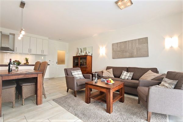 Villa Verdi Ferienwohnung 4 Wangerooge - Wohn und Essbereich. Hochwertige Möbel laden zum relaxen ein.