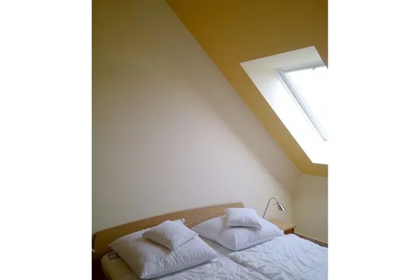 Schlafzimmer mit Doppelbett Residenz am Strand Wohnung 2-44