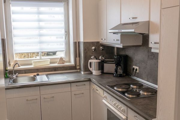 Ferienanlage Neuschwansteinblick Ferienwohnung 101 Ferienwohnungen in Füssen - Küche, Essbereich, Wohnzimmer